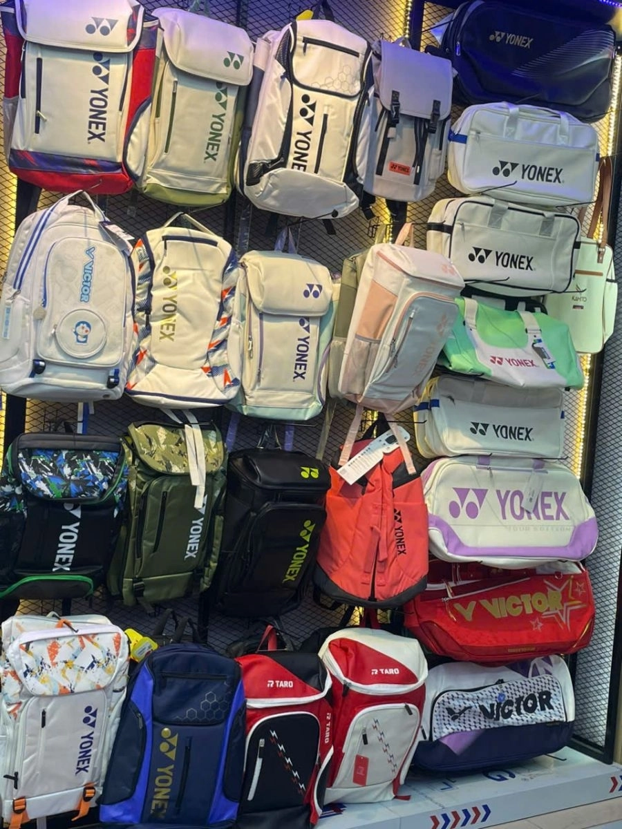 Backpack and sports bag area at ShopVNB Cam Le